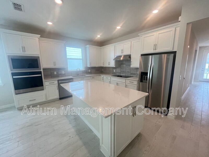 Welcome to this BRAND NEW 4-bedroom, 2-bathroom home located in the community of Canopy Terrace property image