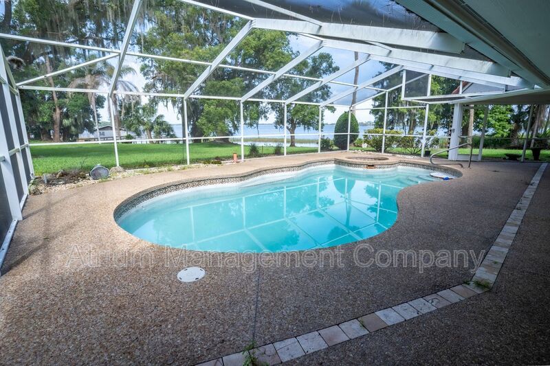 Stunning 3-Bedroom, 3-Bathroom Lakeside Home in Mount Dora with Private Pool & Lakefront Living property image
