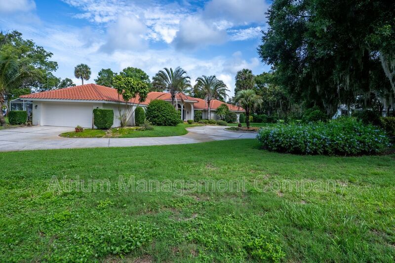 Stunning 3-Bedroom, 3-Bathroom Lakeside Home in Mount Dora with Private Pool & Lakefront Living property image
