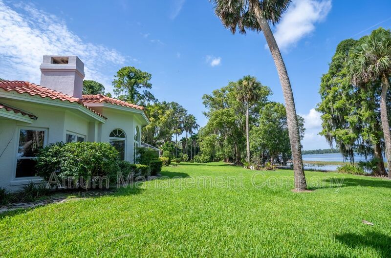 Stunning 3-Bedroom, 3-Bathroom Lakeside Home in Mount Dora with Private Pool & Lakefront Living property image