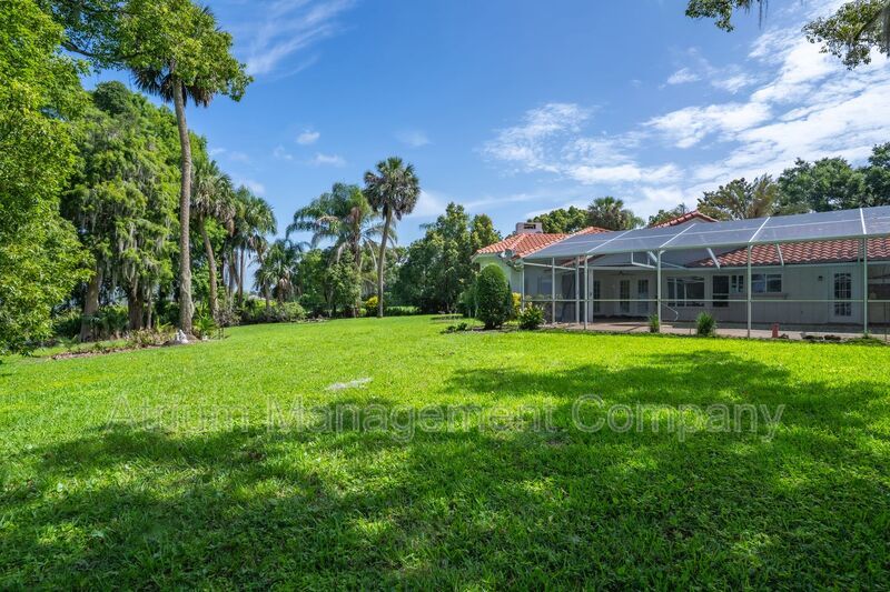 Stunning 3-Bedroom, 3-Bathroom Lakeside Home in Mount Dora with Private Pool & Lakefront Living property image