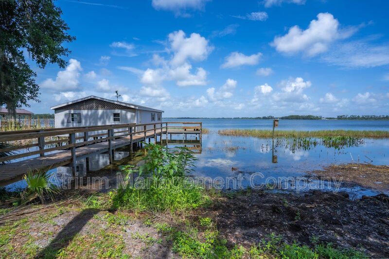 Stunning 3-Bedroom, 3-Bathroom Lakeside Home in Mount Dora with Private Pool & Lakefront Living property image