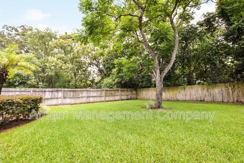 Charming 4/2 Colonial Town North Home with Oversized Fenced Yard property image