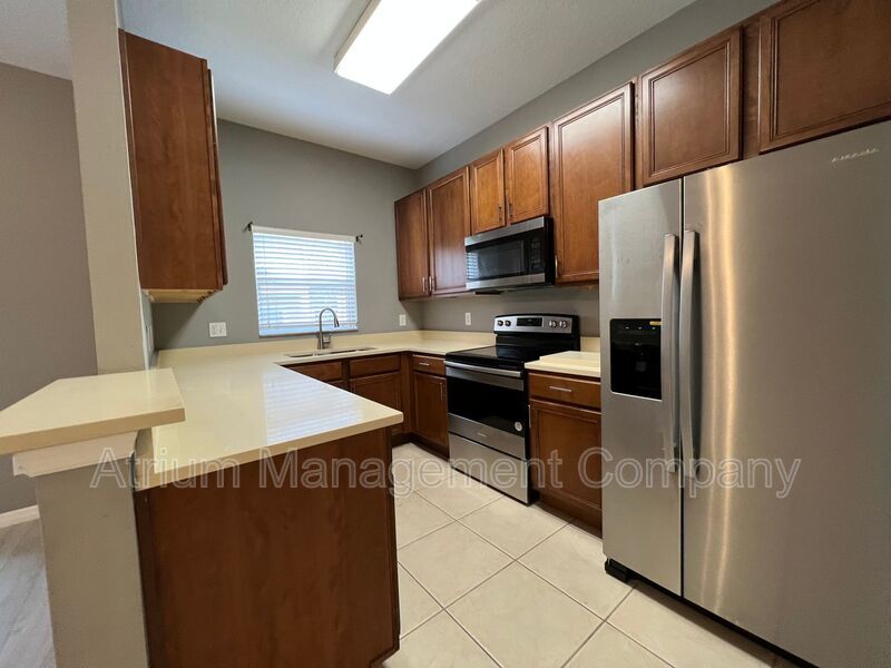 Beautiful 3 Bed, 2.5 Bath Gated Condo for Rent in Sanford/Lake Mary, FL – $500 Off First Month’s Rent! property image