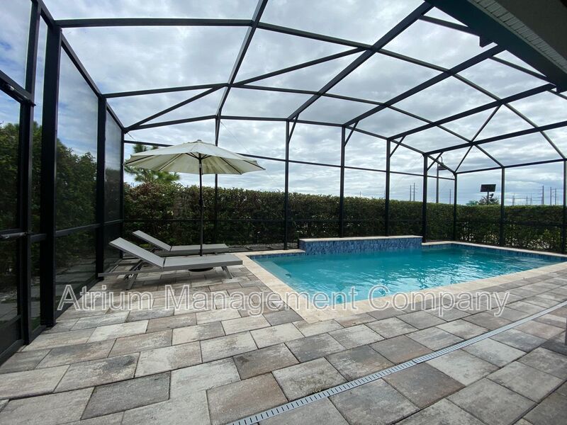 Spacious 5 Bedroom Pool Home with In-Law Suite in Lake Nona’s Coveted Storey Park! property image