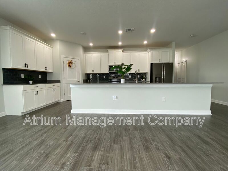 Spacious 5 Bedroom Pool Home with In-Law Suite in Lake Nona’s Coveted Storey Park! property image