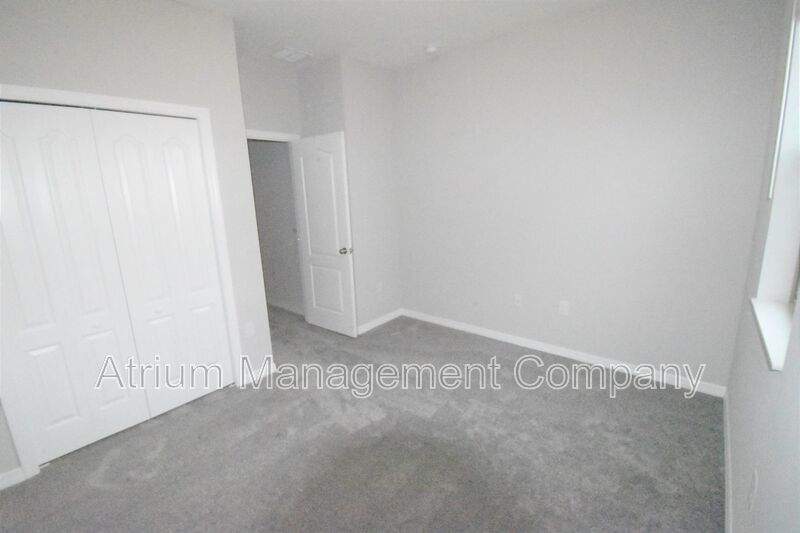 PREMIUM NEW CONSTRUCTION TOWN HOME IN TOWNS AT WHITE CEDAR property image