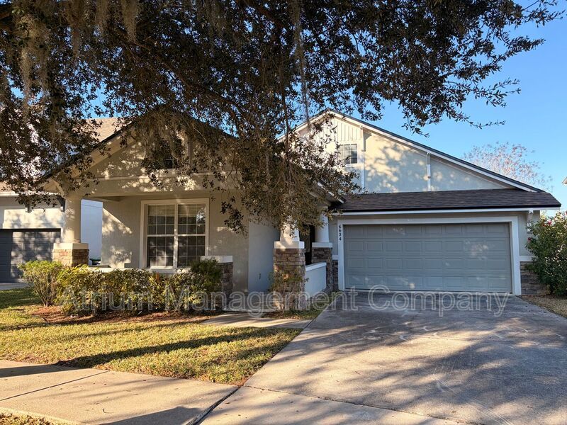 Charming 3BR Winter Garden Home | Spacious Layout, Preserve View & Screened Patio property image