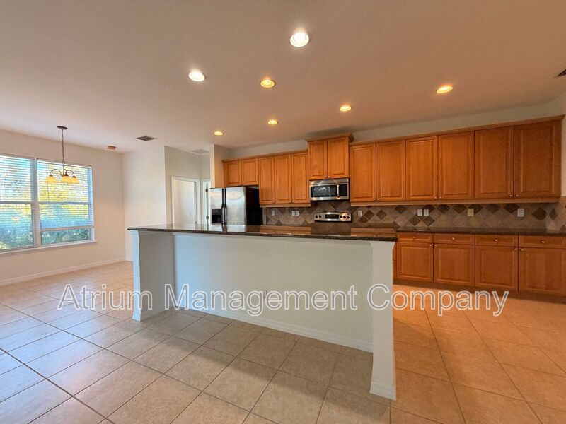 Charming 3BR Winter Garden Home | Spacious Layout, Preserve View & Screened Patio property image