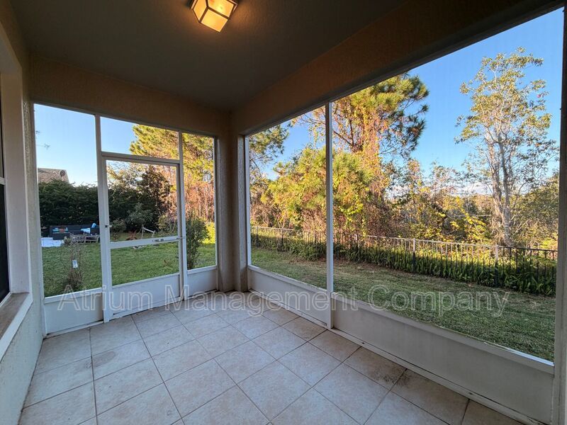Charming 3BR Winter Garden Home | Spacious Layout, Preserve View & Screened Patio property image