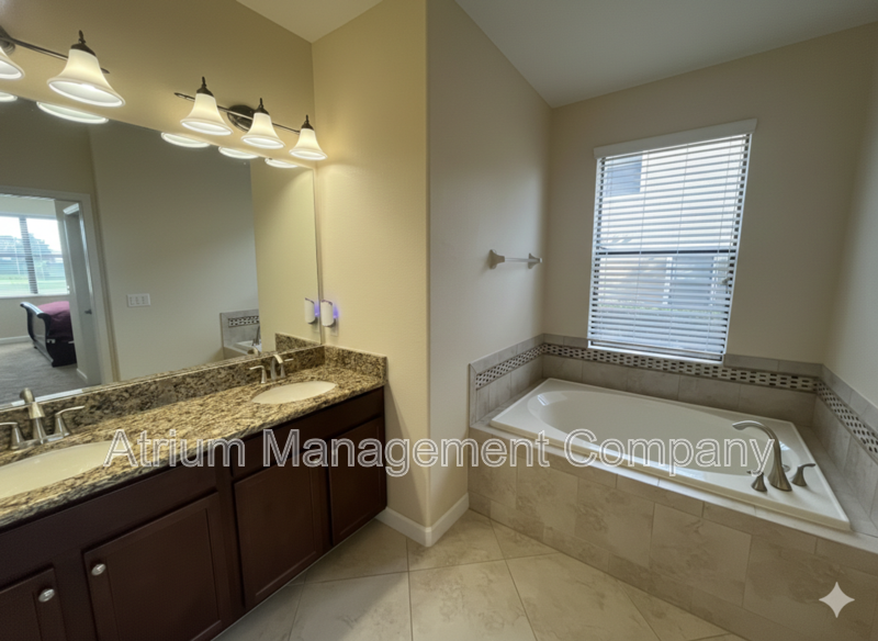 Luxury Golf Course Living in ChampionsGate: 2-Bedroom Condo at Champions Club property image