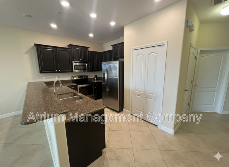 Luxury Golf Course Living in ChampionsGate: 2-Bedroom Condo at Champions Club property image