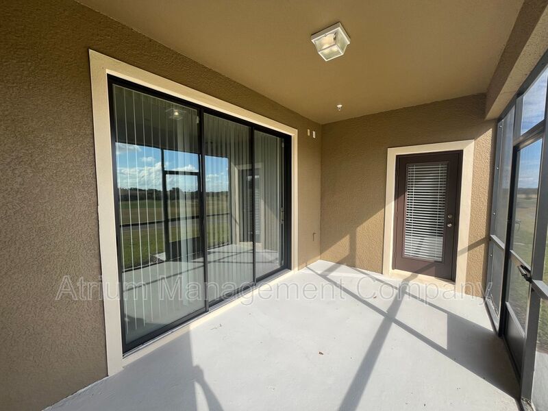 Luxury Golf Course Living in ChampionsGate: 2-Bedroom Condo at Champions Club property image